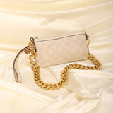 Gucci Embossed Mini Pochette