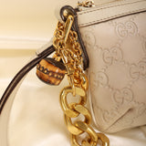 Gucci Embossed Mini Pochette
