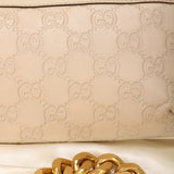 Gucci Embossed Mini Pochette