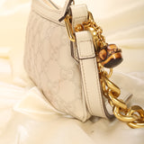 Gucci Embossed Mini Pochette