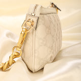 Gucci Embossed Mini Pochette