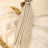 Gucci Embossed Mini Pochette