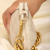 Gucci Embossed Mini Pochette