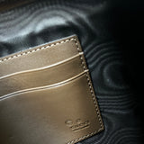 Gucci Embossed Clutch
